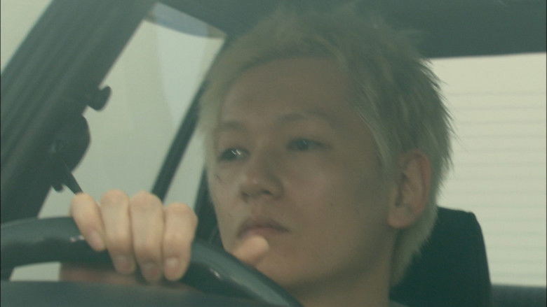 кадр из фильма 青い車