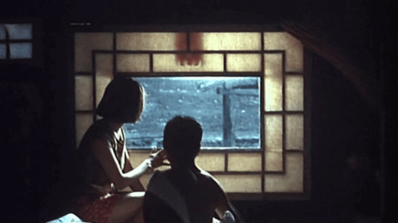 кадр из фильма 二嫫