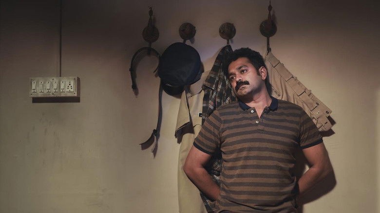 кадр из фильма കൂമൻ