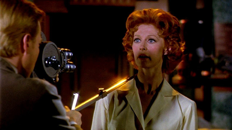 кадр из фильма Подглядывающий