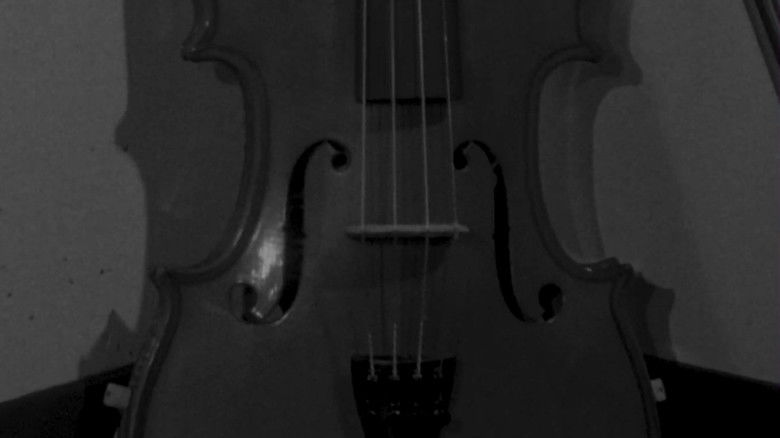 кадр из фильма The String That Binds Me