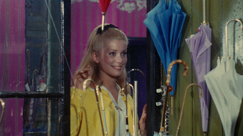 кадр из фильма Шербурские зонтики