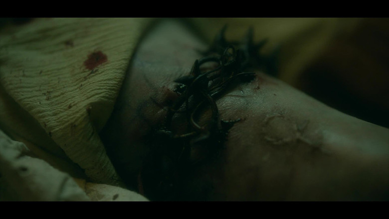 кадр из фильма Сущность. Семейный кошмар