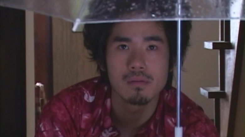 кадр из фильма Посетитель Q