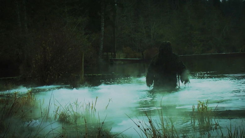 кадр из фильма Болотное чудовище