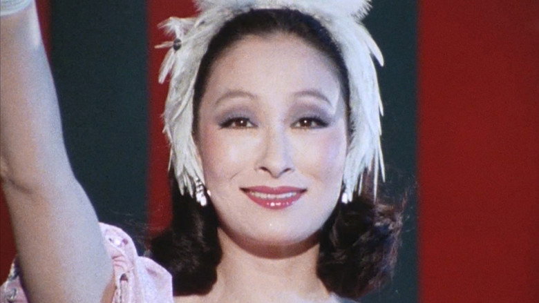кадр из фильма 江戸川乱歩の「暗黒星」 より 黒水仙の美女