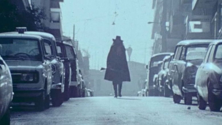 кадр из фильма Πέφτουν οι σφαίρες σαν το χαλάζι κι ο τραυματισμένος καλλιτέχνης αναστενάζει