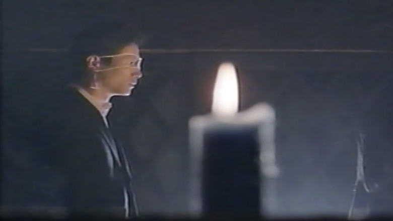 кадр из фильма 逆さ吊し縛り縄