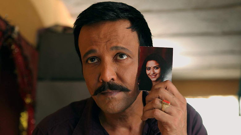 кадр из фильма Saat Uchakkey