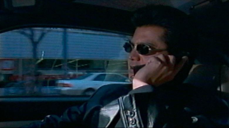 кадр из фильма 強請（ゆすり）