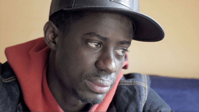 кадр из фильма Migrants Arc-en-Ciel