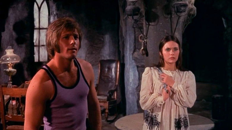 кадр из фильма Замок зла