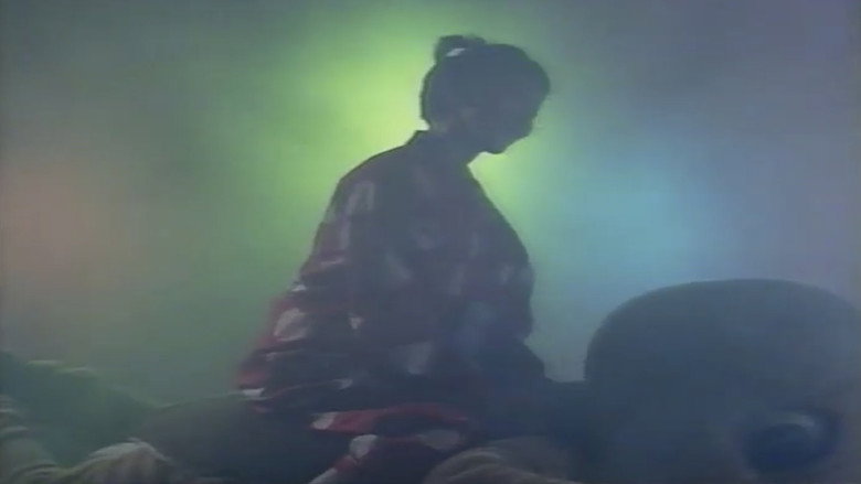 кадр из фильма 悶絶OL 異常な前戯