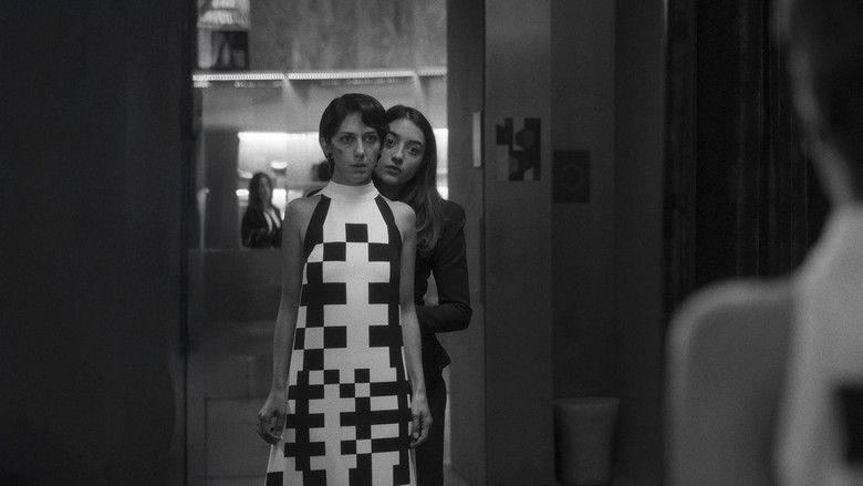 Два человека обмениваются слюной