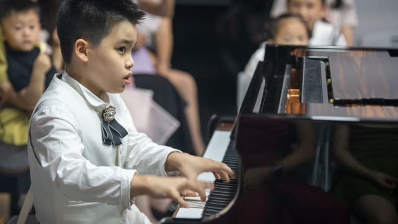 кадр из фильма Les enfants pianistes chinois et leur rêve de carrière