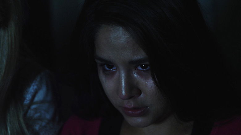 кадр из фильма Незнакомцы на пороге