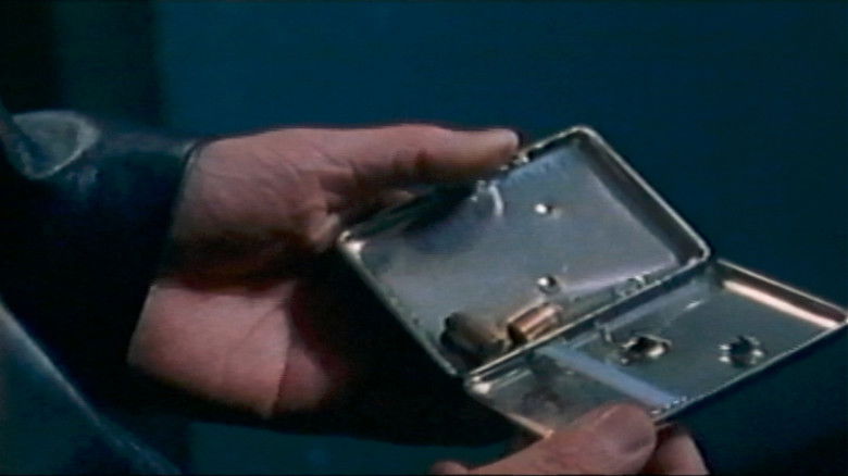 кадр из фильма 強請（ゆすり）