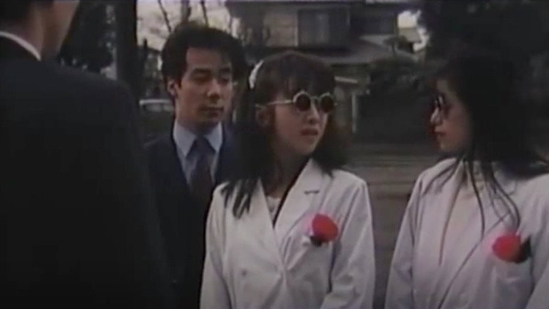 кадр из фильма 痴漢電車　後ろから揉ませて