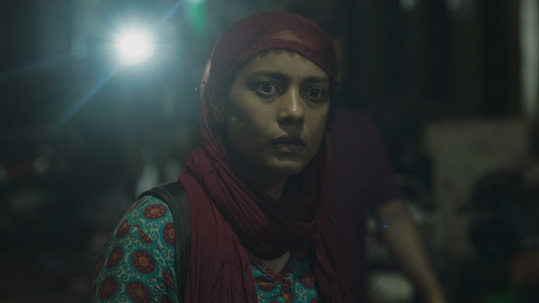 кадр из фильма Сантош