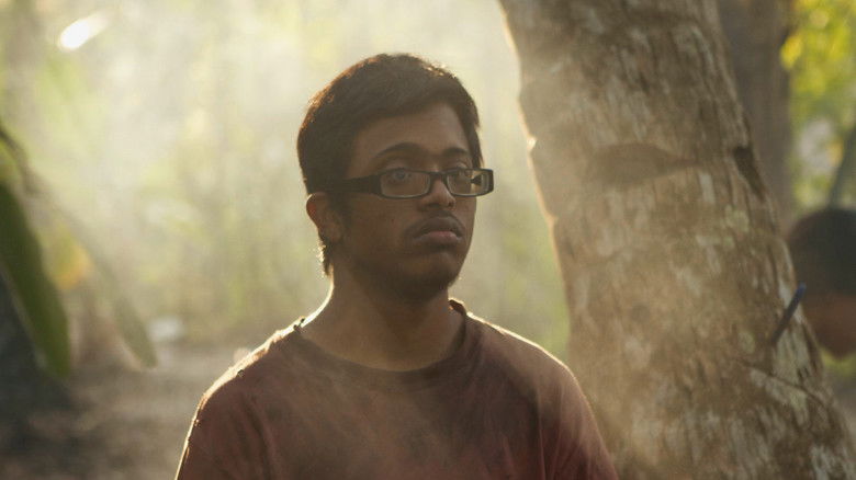 кадр из фильма இனம்