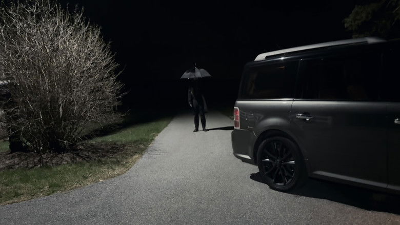 кадр из фильма The Man with the Black Umbrella