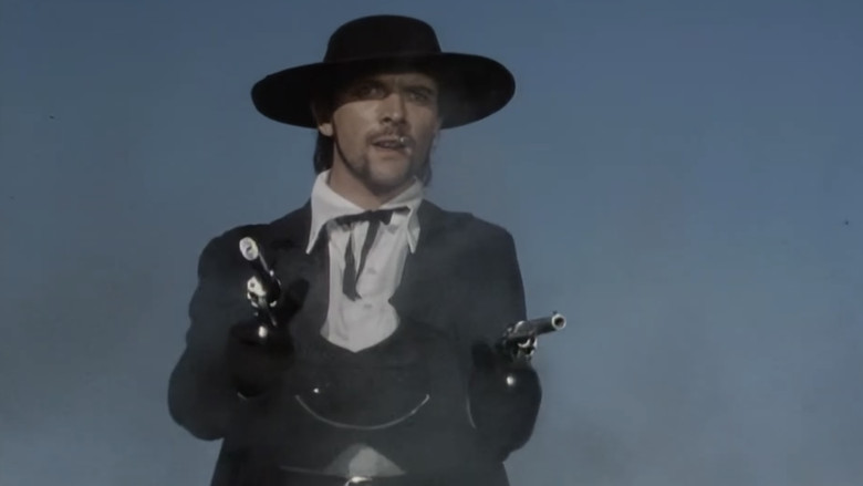 кадр из фильма A Fistful of Travellers' Cheques